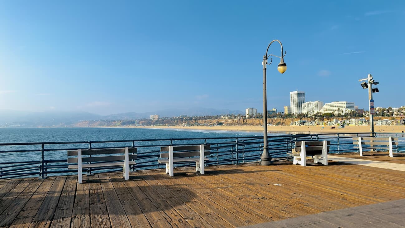 Santa Monica Pier and beach stretching along the Pacific, California