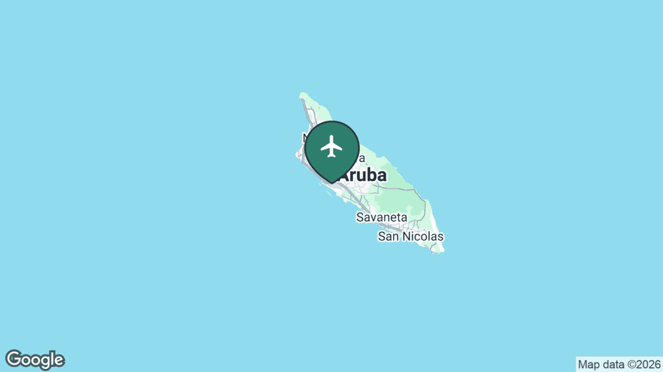 Map showing the location of Queen Beatrix International Airport (AUA) on the south-west coast of Aruba, just outside the capital Oranjestad