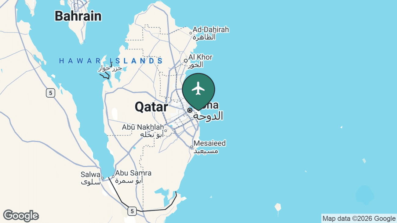 Map showing the location of Hamad International Airport (DOH) on the east coast of Qatar, just south of central Doha