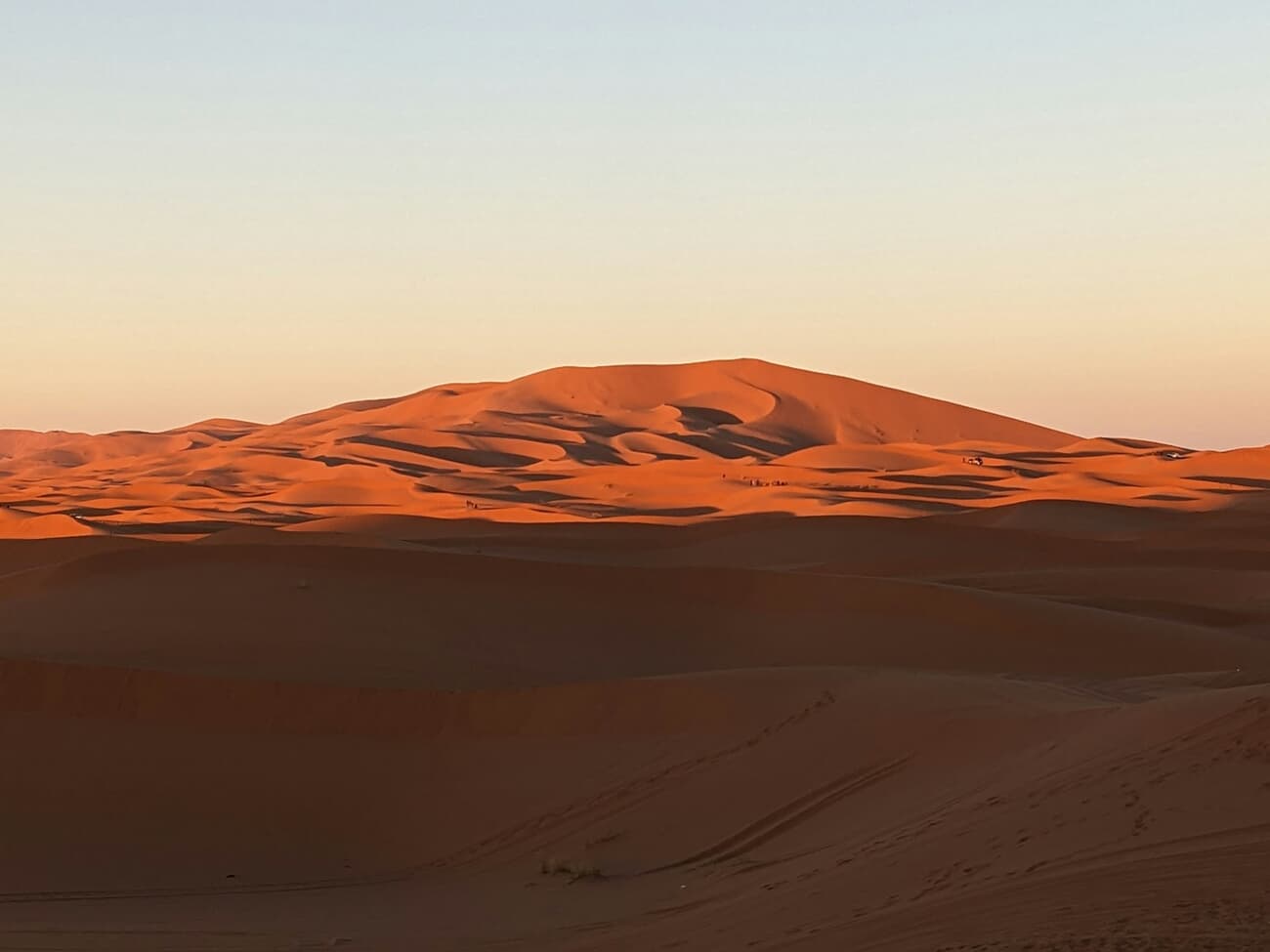 Golden sand dunes of the Sahara desert at Merzouga in southern Morocco