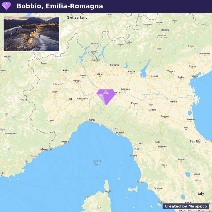 Map of Italy highlighting the location of Bobbio in Emilia Romagna with a small inset photo of a twilight scene over a river in Bobbio.