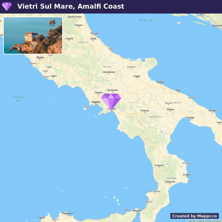 Map of Italy highlighting the location of Vietri Sul Mare on the Amalfi Coast near Naples, with a small inset image of a coastal watchtower overlooking the sea.