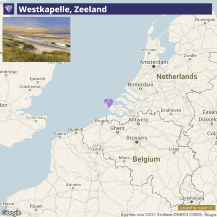 A map showing the location of Westkapelle, Zeeland in the Netherlands, with a small inset picture in the upper left corner depicting a serene beach scene at sunset.