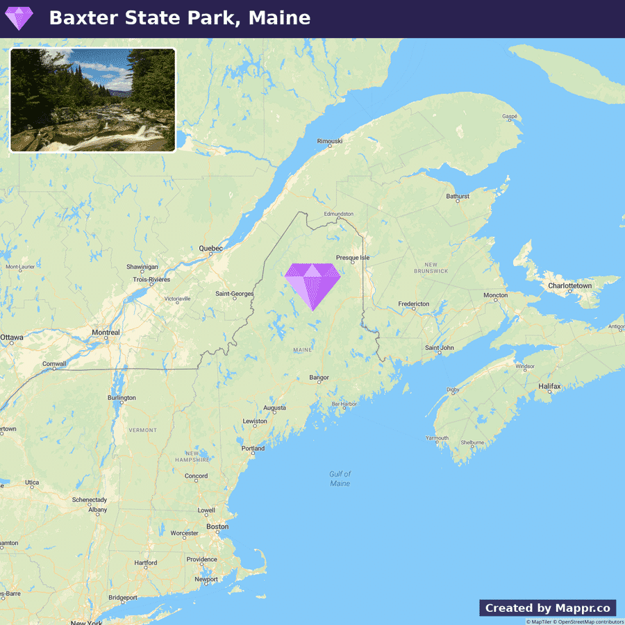 A map showing the location of Baxter State Park in Maine, with an inset photograph of a rocky landscape within the park. The map displays the Northeastern United States and neighboring parts of Canada, with Maine highlighted and the park marked by a purple diamond symbol. Surrounding regions like Quebec, New Brunswick, and Nova Scotia are also visible.