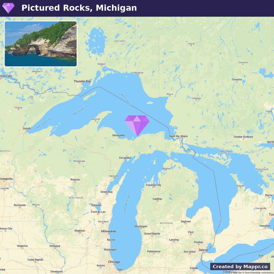 Map highlighting Pictured Rocks National Lakeshore in Michigan with an inset photo of the rocky shoreline with an arch formation over water.