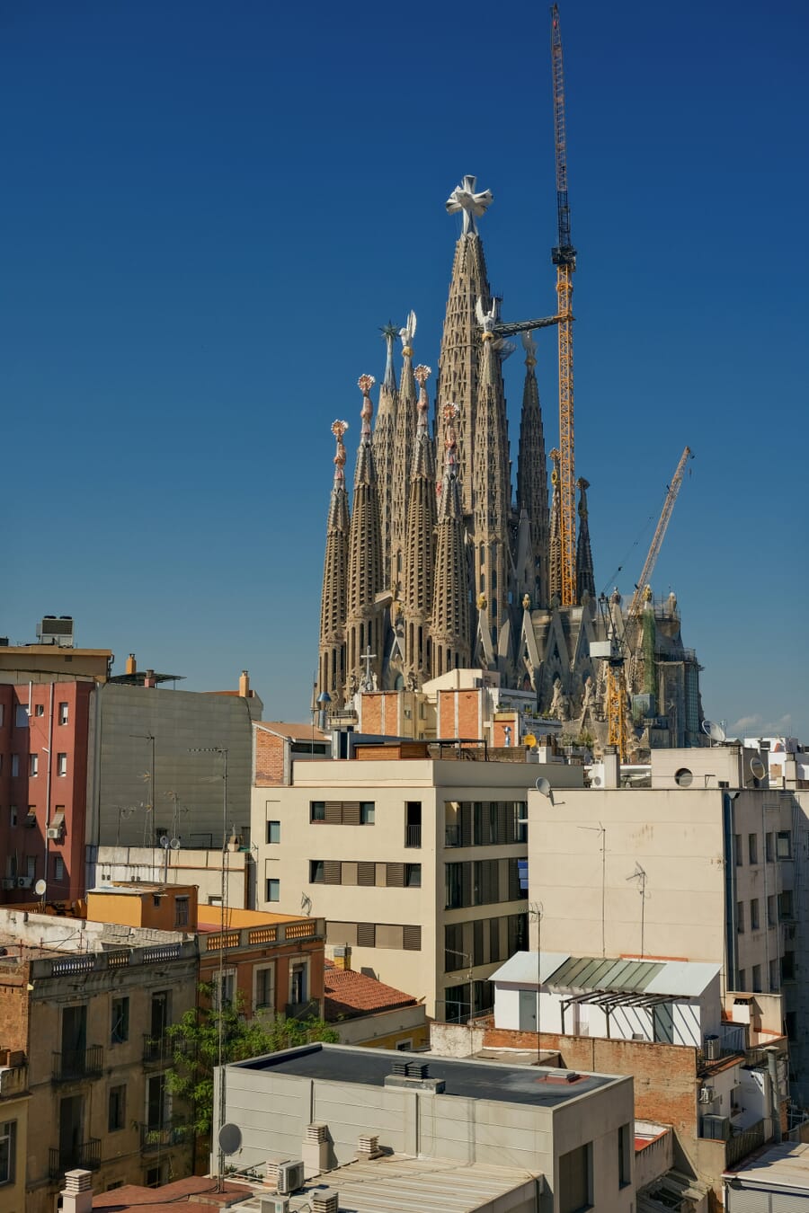 The Sagrada Família towering over Barcelona, crowned by the new central Tower of Jesus Christ and its cross