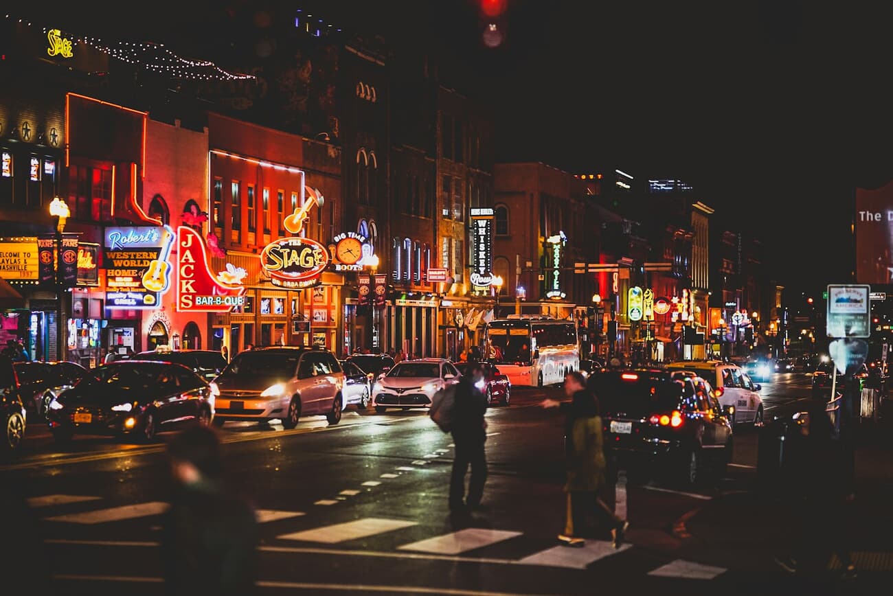 Neon signs light up the honky-tonks along Lower Broadway in Nashville, Tennessee