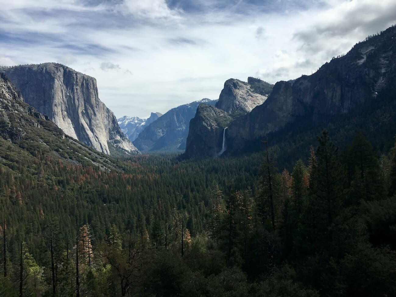 El Capitan and Bridalveil Fall frame the classic Tunnel View of Yosemite Valley, California