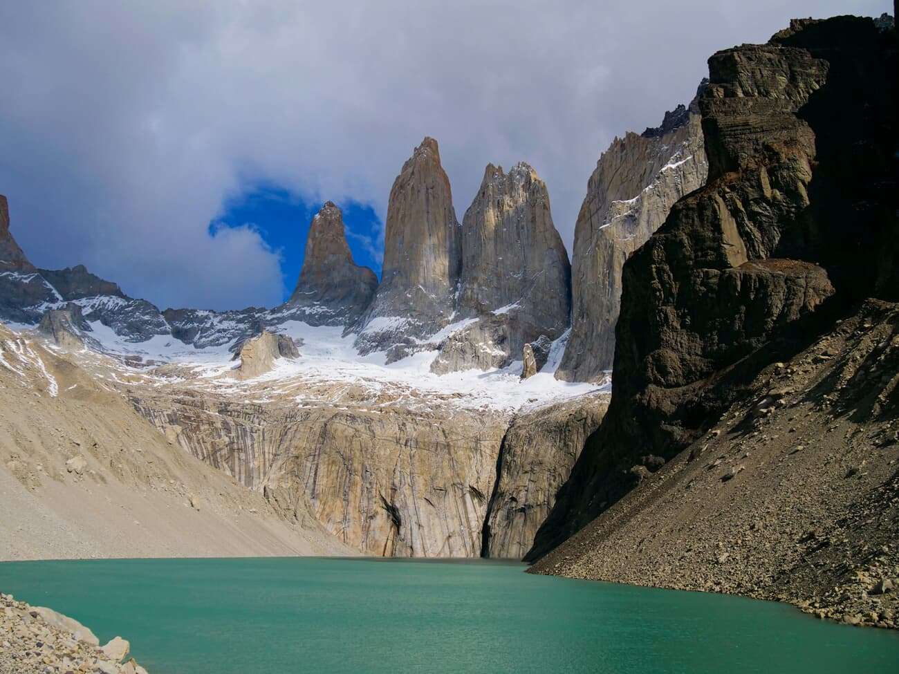 The granite towers of Torres del Paine stand over a glacial lake in Chilean Patagonia