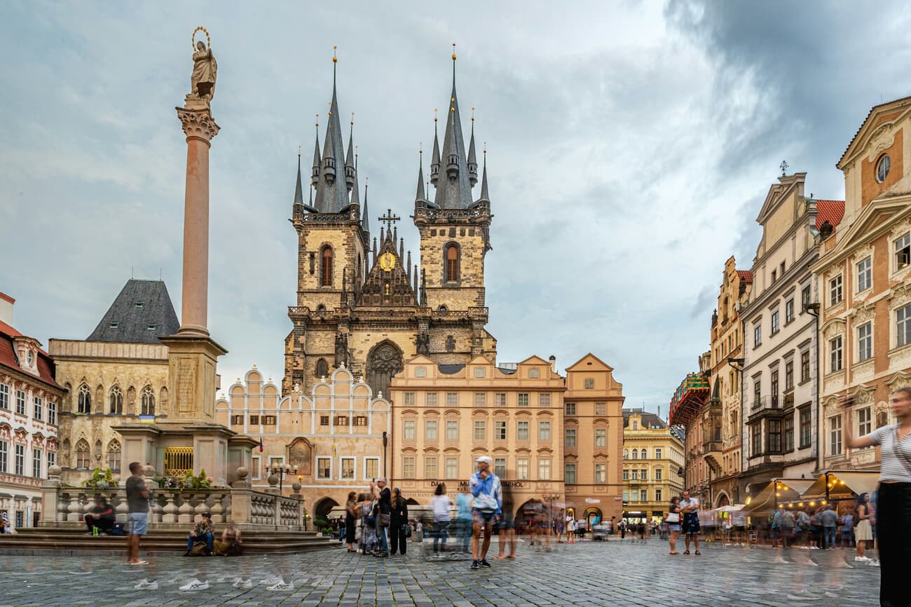 Old Town Square's spires and pastel facades crowd together in Prague, Czech Republic