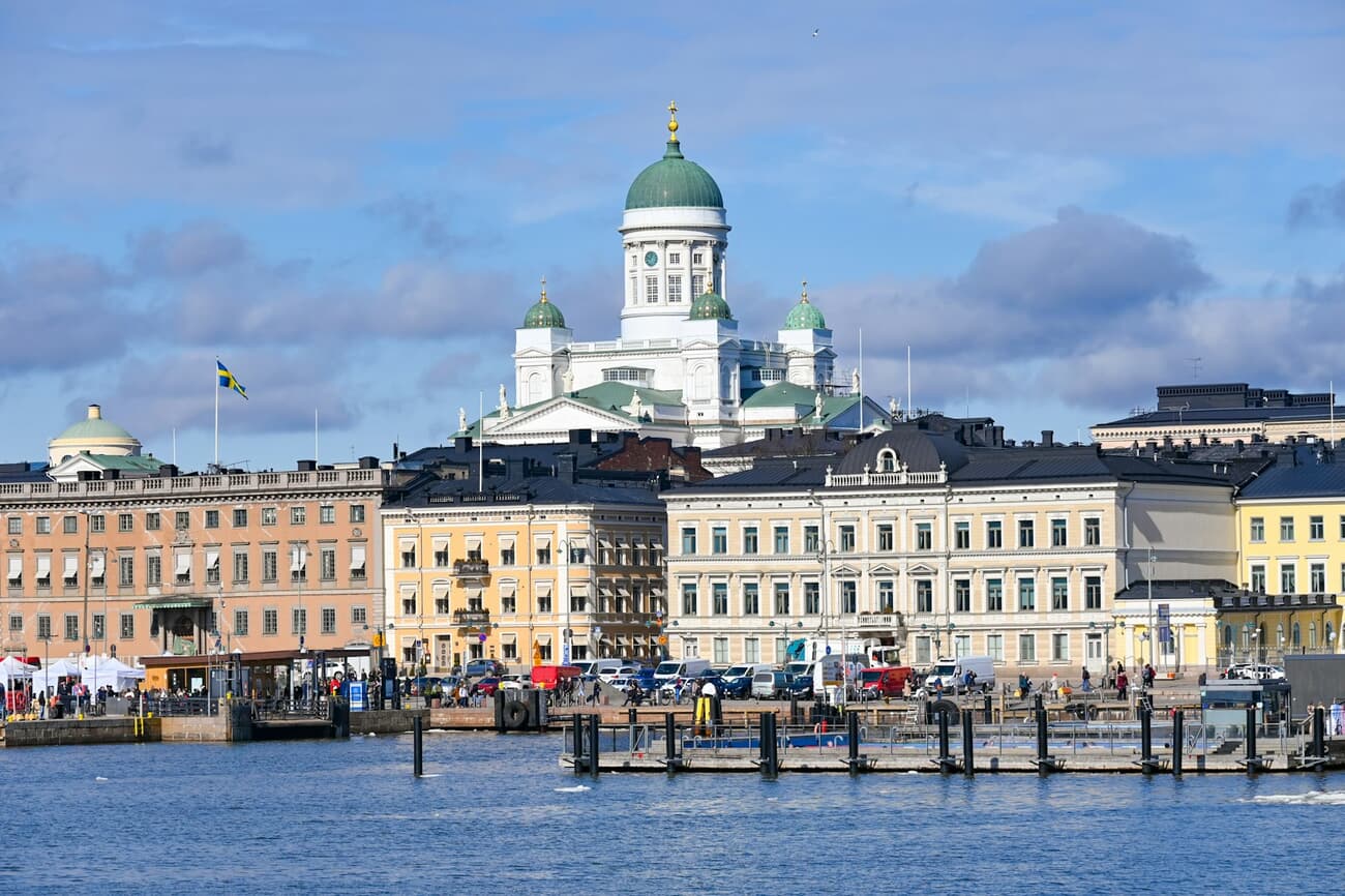 Verdant Dome Over Helsinki Harbor: White Cathedral Anchoring a Colorful Waterfront