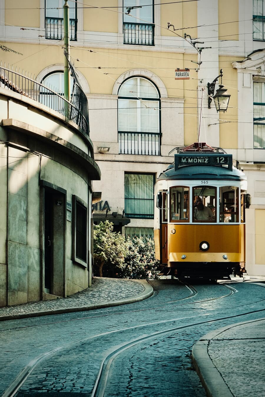 Historic Tram Navigating Lisbon's Winding Streets