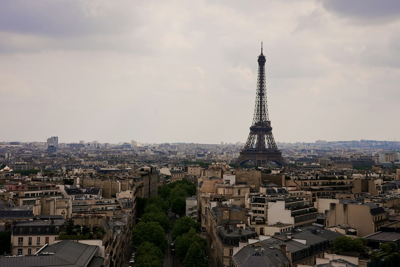 Eiffel Tower Over a Quiet Parisian Skyline in Muted Light