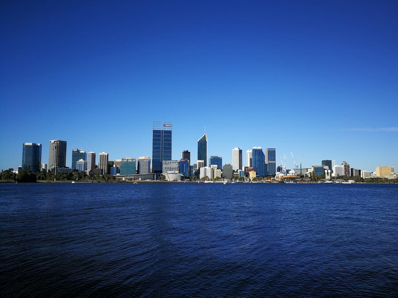 Urban Skyline Reflected in Tranquil Waters
