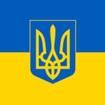 Ukrainian flag featuring the coat of arms.