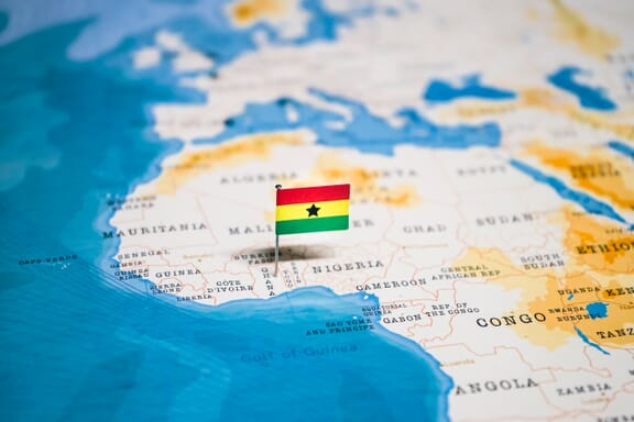 Pin pointing out Ghana on the map of Africa