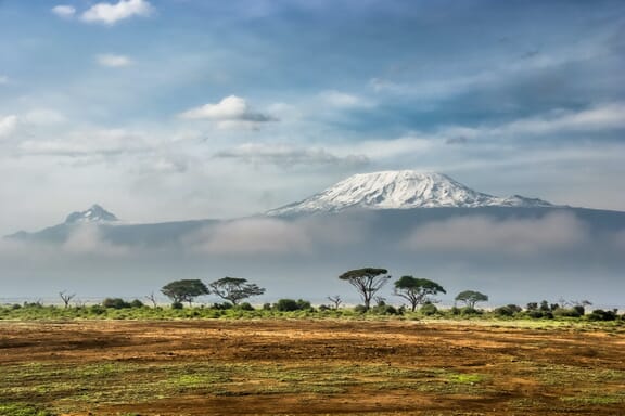 Snow-covered Mount Kilimanjaro can be seen from Amboseli National Park in Kenya.