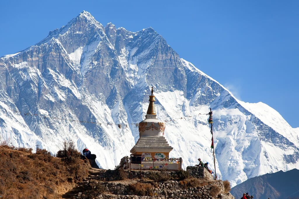 Stupa near Namche Bazar and Mount Lhotse south rock face - way to Everest base camp - Nepal Stupa near Namche Bazar and Mount Lhotse south rock face - way to Everest base camp - Nepal