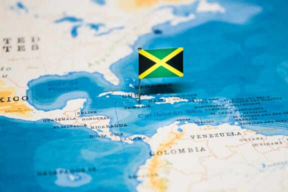 Jamaica pointed out on the map by a flag pin.