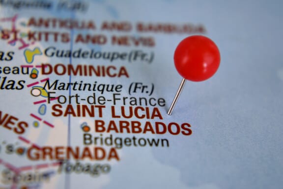 Pin pointing out Saint Luicia on a map.