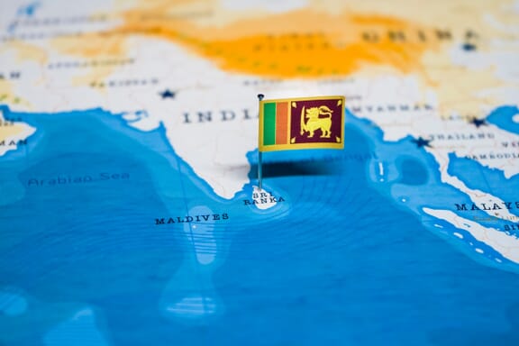 Sri Lanka pointed out on the map by a flag pin.