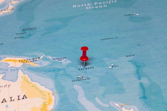 Pin pointing out the Vanuatu on a map.