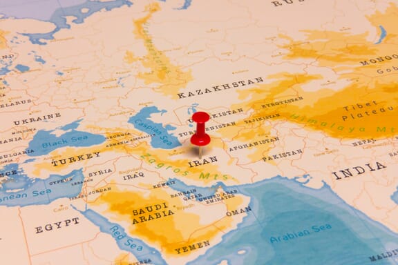 Pin showing Iran on a map