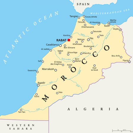 Morocco map with capital Rabat, national borders, important cities and rivers. Political map illustration with English labeling and scaling.
