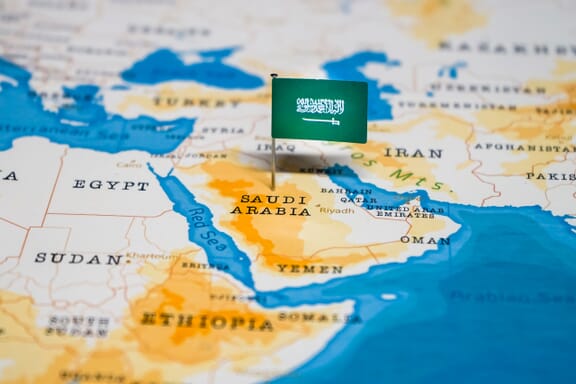 Saudi Arabia location on the map pointed out by a flag pin.