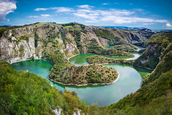 Meanders at rocky river Uvac gorge on sunny day, southwest Serbia. Meanders at rocky river Uvac gorge on sunny day, southwest Serbia.