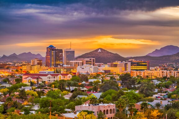 Tucson, Arizona, USA downtown skyline with Sentinel Peak at dusk. Tucson, Arizona, USA downtown skyline with Sentinel Peak at dusk.