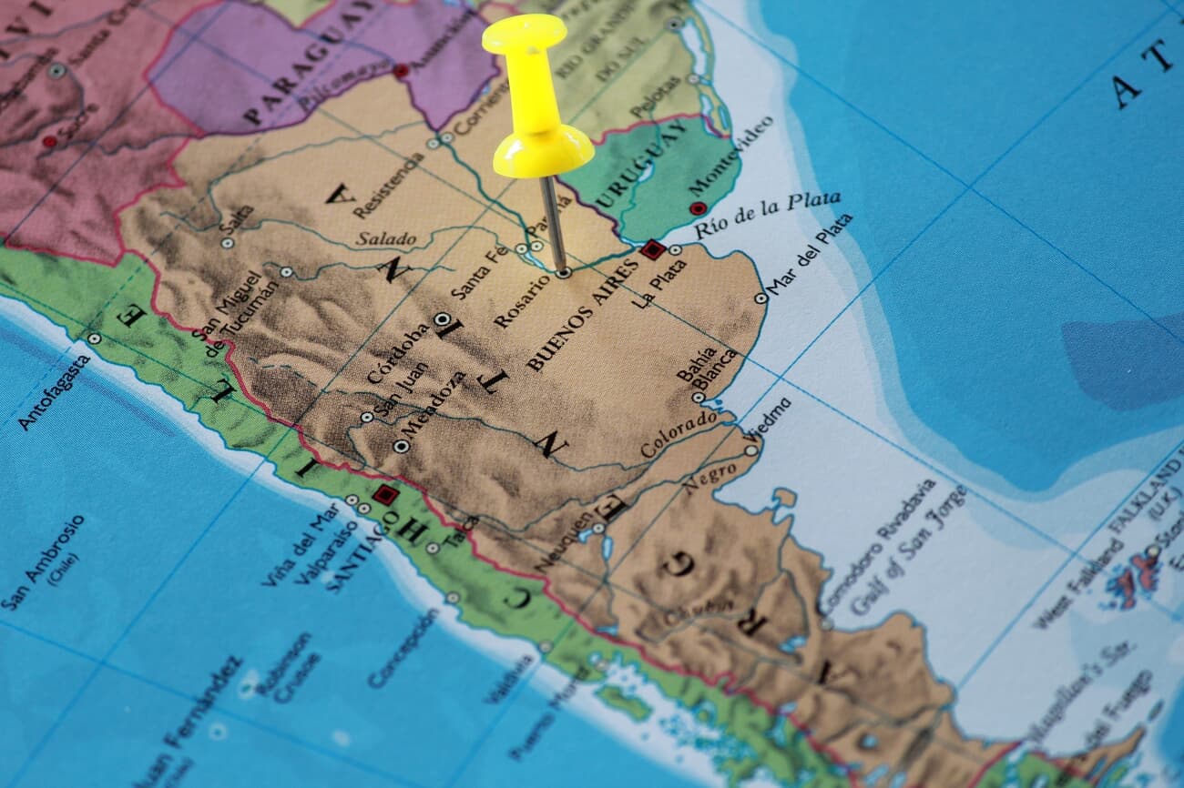 A yellow pin on argentina of the world map travel
