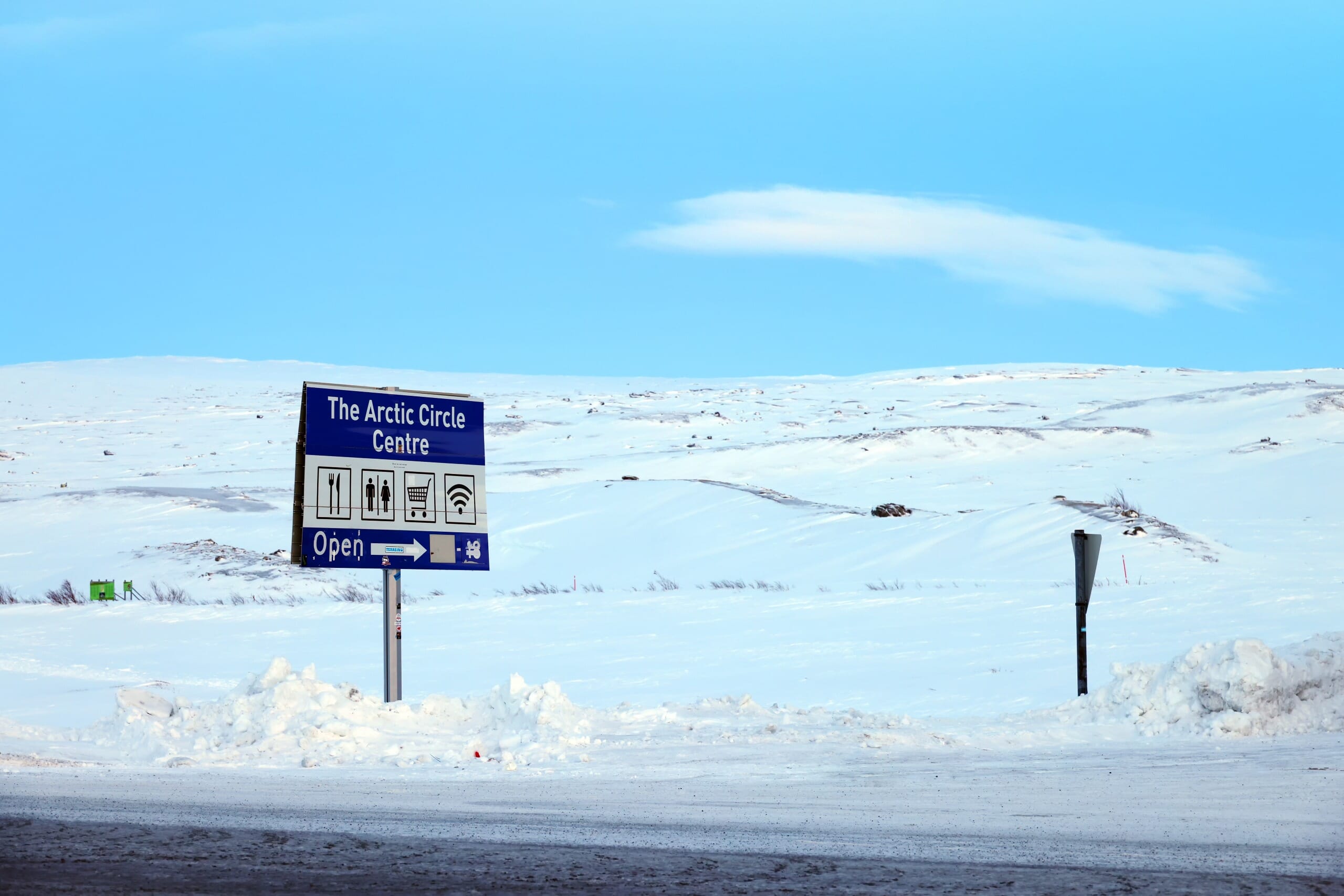 Off road jeep Toyota Land cruiser on a deep snow, traveling across the border from Kyrgyzstan to Tajikistan.