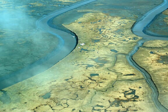 An aerial view of the Bering Sea coast just south of Hooper Bay in the Kusilvak Census Area.