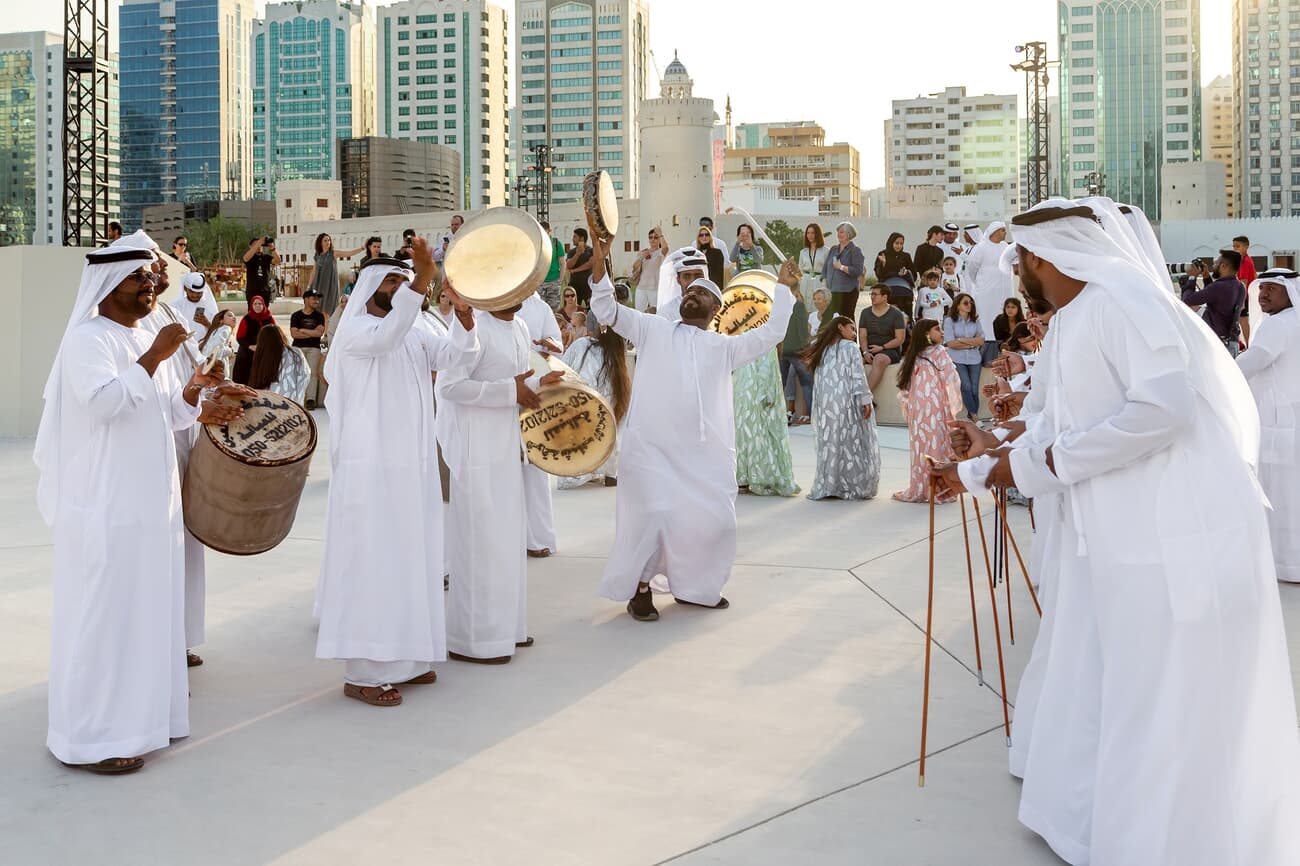Emiratis celebrating Al Hosn Festival, an annual cultural event in Abu Dhabi