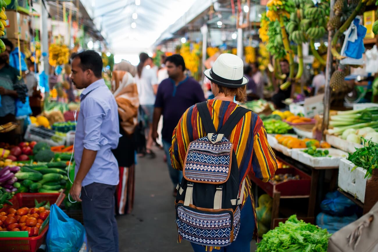 Local and tourists shop in the bustling food markets