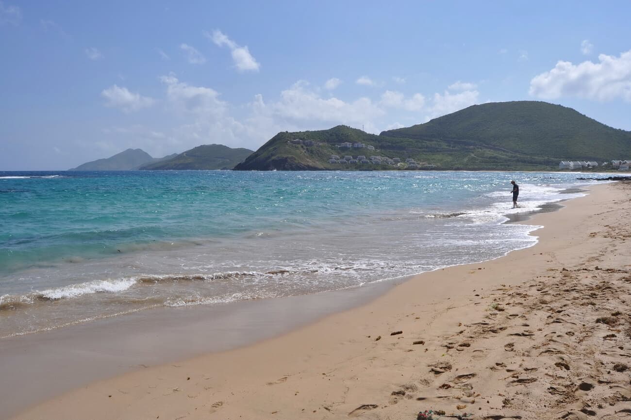 Frigate Bay Beach, known for its dual appeal of calm Caribbean waters and Atlantic surf
