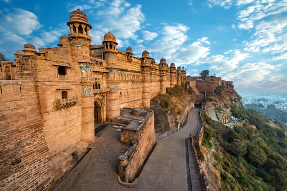 A view of the side of Gwalior Fort and the countryside in the distance in Madhya Pradesh.