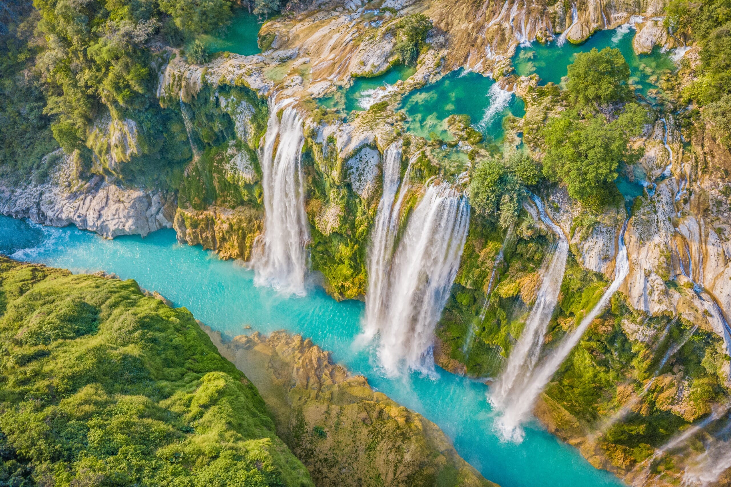 Amazing crystalline blue water of tamul waterfall at huasteca potosina