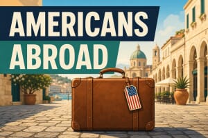 Editorial illustration with the title "Americans Abroad" in navy and teal color blocks above a stylized brown leather suitcase with a US flag luggage tag sitting on European cobblestone with a Mediterranean plaza background