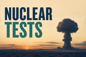 Nuclear tests by country, illustrated with a distant mushroom cloud over a desert at dusk